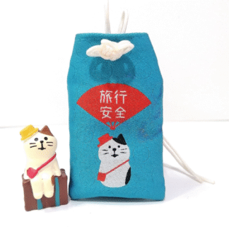 Muñeco de gatito con maleta de viaje