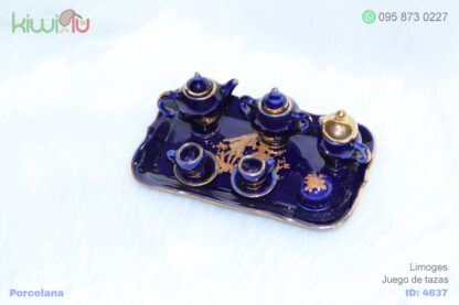 Adorno de juego de tazas de porcelana color azul con filos dorados
